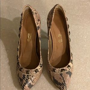 Santa Lolla Snakeskin Pumps